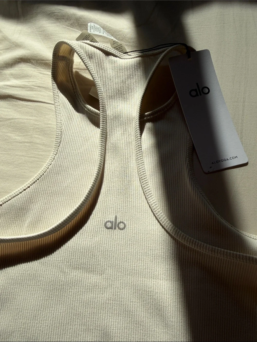 ALO Yoga Cream Ribbed High-Neck Racerback Bodysuit